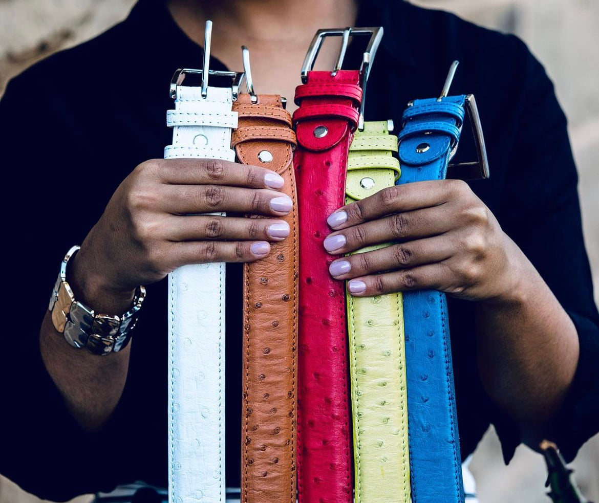 Lady Holding Ostrich Leather Belts